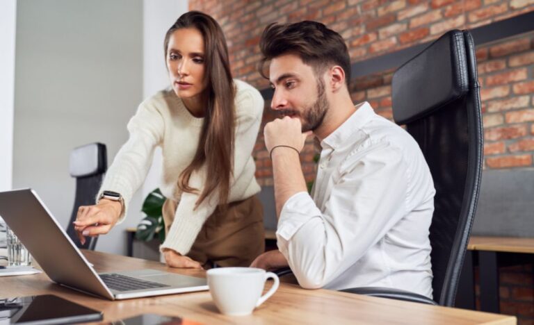 a manager training a new employee