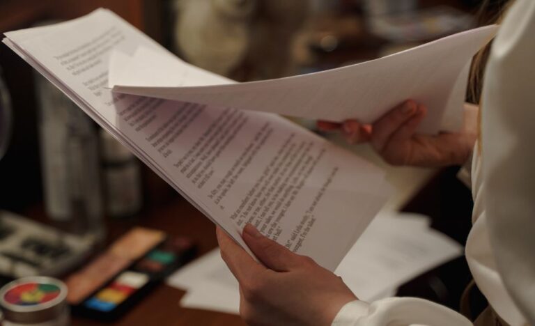 a person reviewing a presentation script