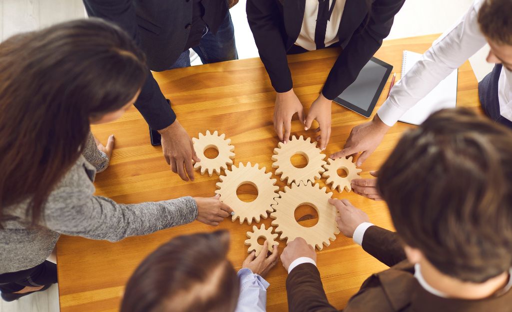 representation of a team working together to each off feedback on presentation files