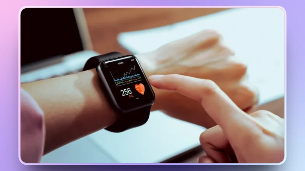 Person interacting with black smartwatch displaying activity and calorie data.