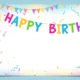 Colorful "Happy Birthday" banner with balloons, confetti, and a two-tiered birthday cake.