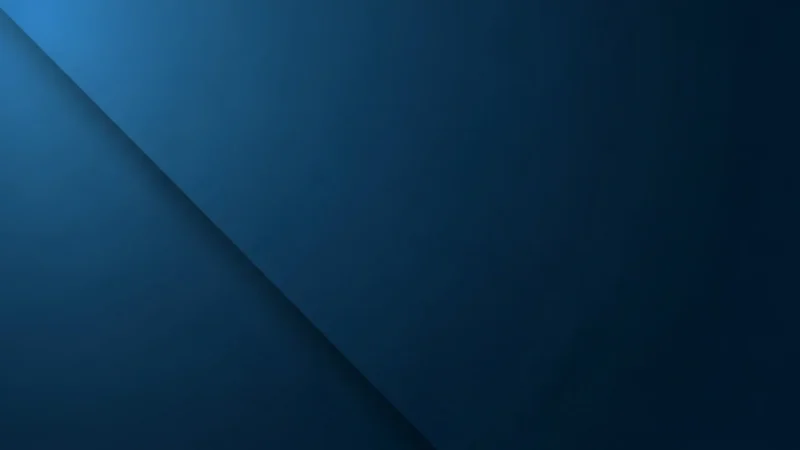 Abstract geometric background with overlapping dark and light blue diagonal shapes.