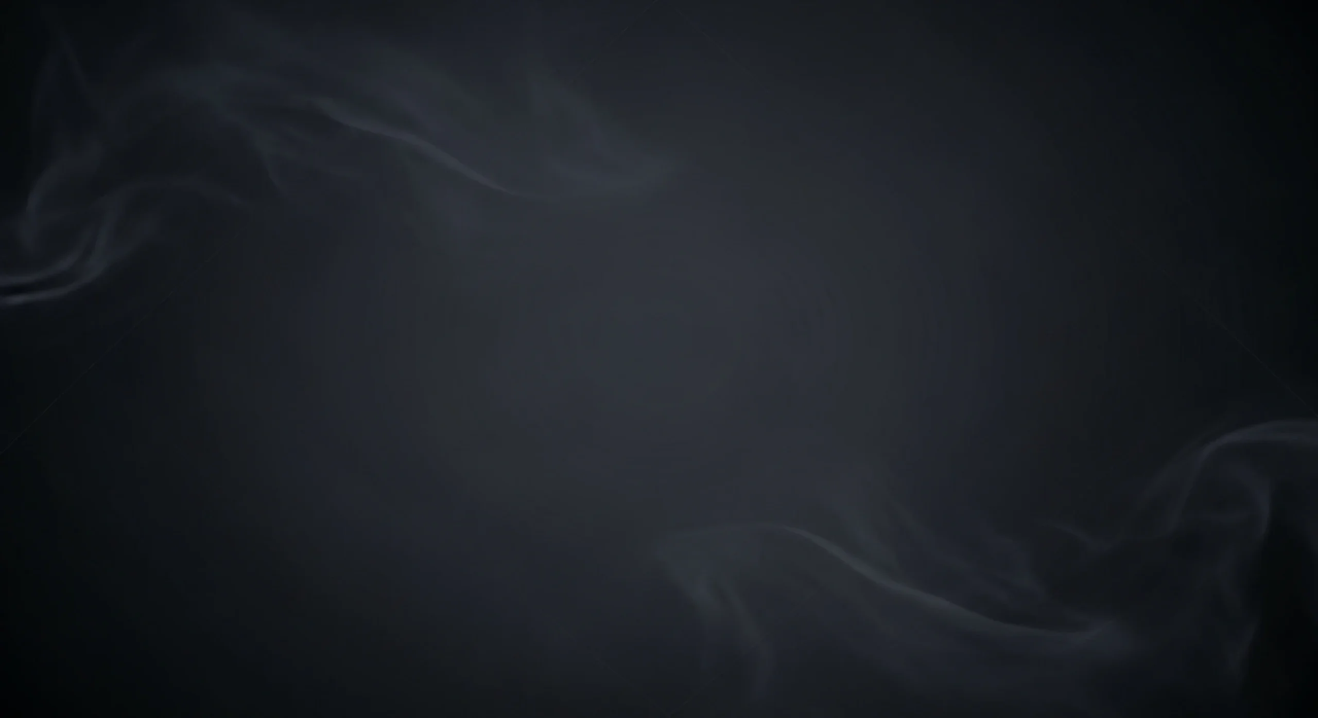 Dark background with subtle, wispy gray smoke curling across the edges.
