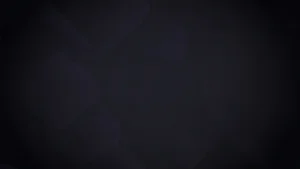 Abstract dark background with subtle overlapping geometric shapes in deep blue and black tones.