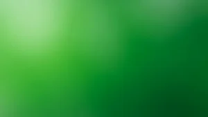 Abstract green gradient background with light and dark shades blending smoothly.