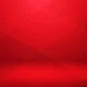 Abstract geometric background with overlapping red gradient shapes and smooth lighting.