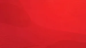 Abstract red background with subtle wavy lines and gradient shading.