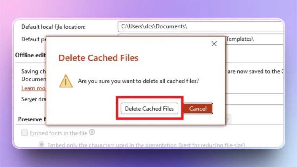 Popup window on computer screen asking for confirmation to delete cached files, with buttons "Delete Cached Files" and "Cancel.
