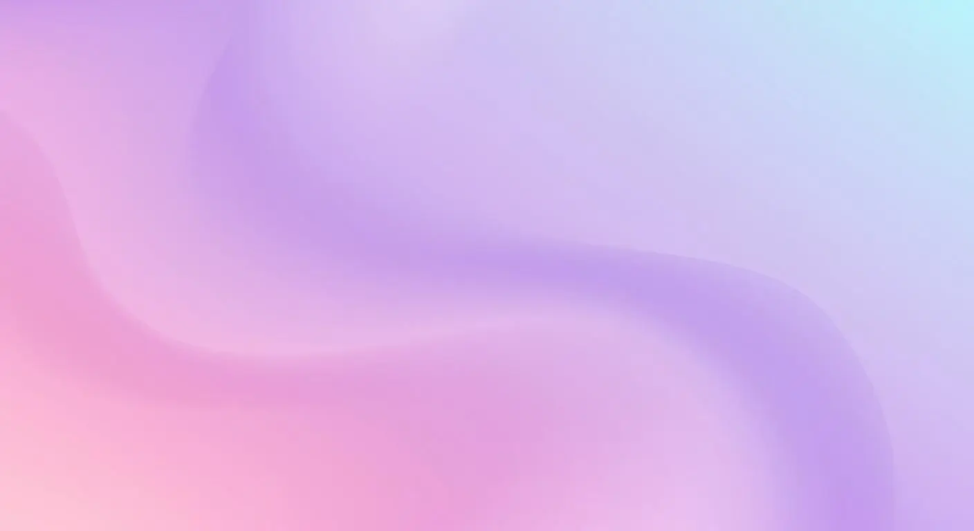 Abstract smooth gradient background with blended pastel shades of pink, purple, and light blue.