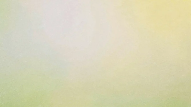 Blurred gradient background with soft pastel shades of green, yellow, and pink.