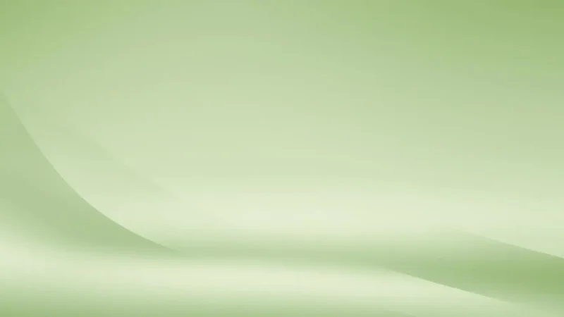 Abstract smooth gradient background with light green and subtle curved shapes.
