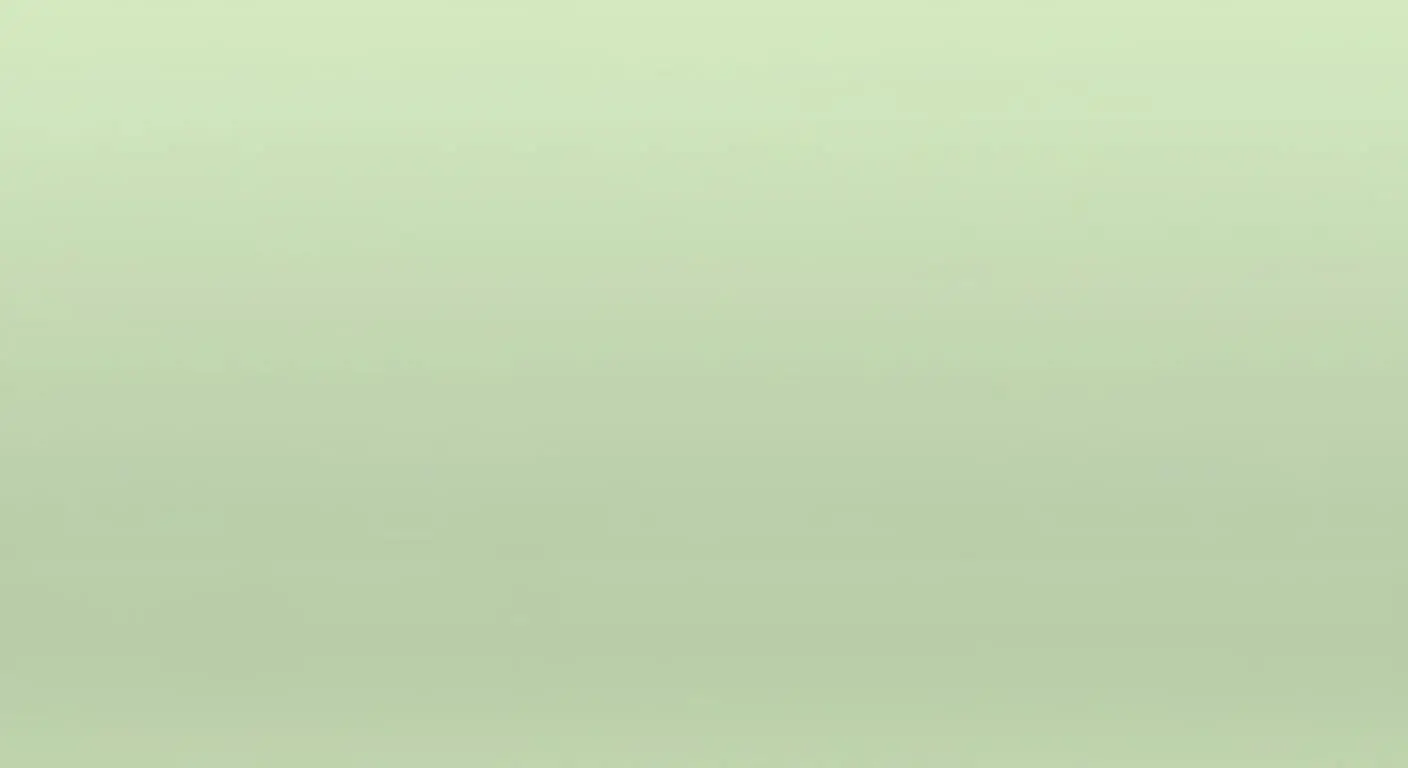 Plain light green background with subtle horizontal shading and no objects or text.