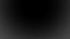 Black gradient background transitioning from dark gray to black.