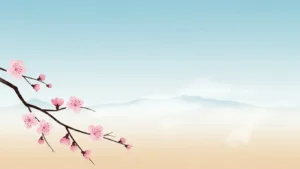 Delicate pink cherry blossoms on a branch with misty mountains and clear sky background.