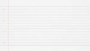 Blank white lined notebook paper with red margin line and four punched holes on left side.