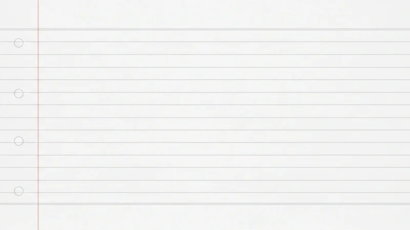 Blank white lined notebook paper with red margin line and four punched holes on left side.