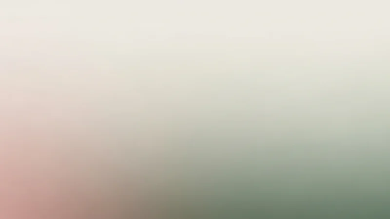 Blurred gradient background with soft tones of beige, pink, and green.
