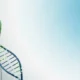 Illustration of a green and blue DNA double helix strand on a gradient blue background.