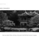 Black and white image of a traditional Japanese garden with a pagoda-style building and lush foliage.