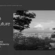 Black and white photograph of Mount Fuji with a traditional Japanese pagoda and cityscape in the foreground.