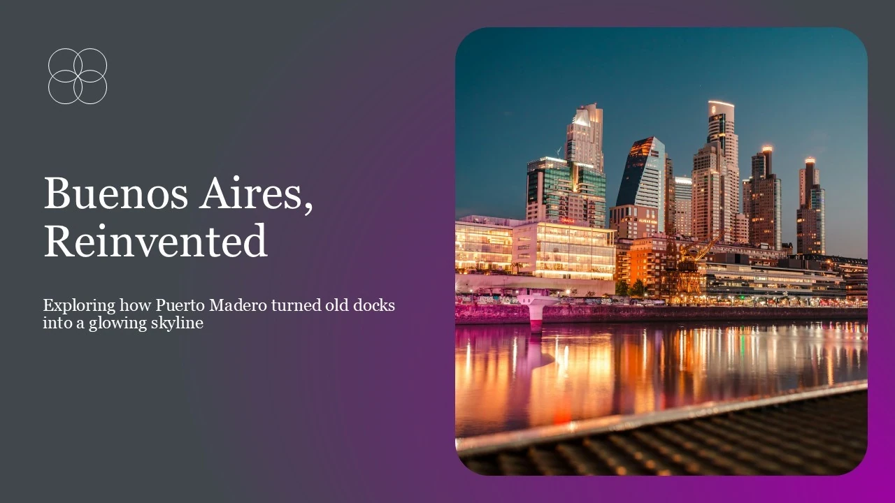 Nighttime view of Puerto Madero skyline in Buenos Aires with illuminated modern buildings reflecting on water.