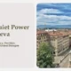Aerial view of Geneva's historic buildings with red-tiled roofs under a partly cloudy blue sky.