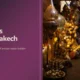 Traditional illuminated brass lanterns and metalware displayed in a narrow Marrakech souk aisle.