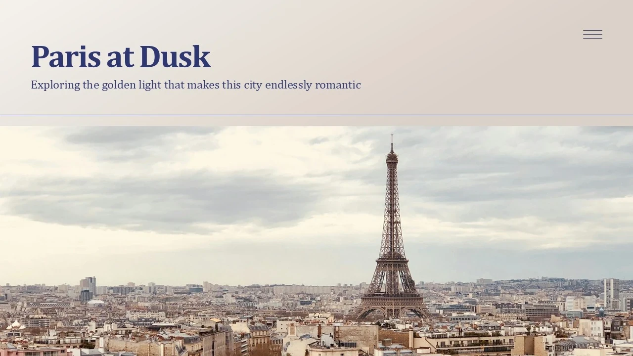 Panoramic view of Paris skyline at dusk featuring the Eiffel Tower under a cloudy sky.