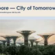 Futuristic Supertree structures at Gardens by the Bay, Singapore, during sunset.