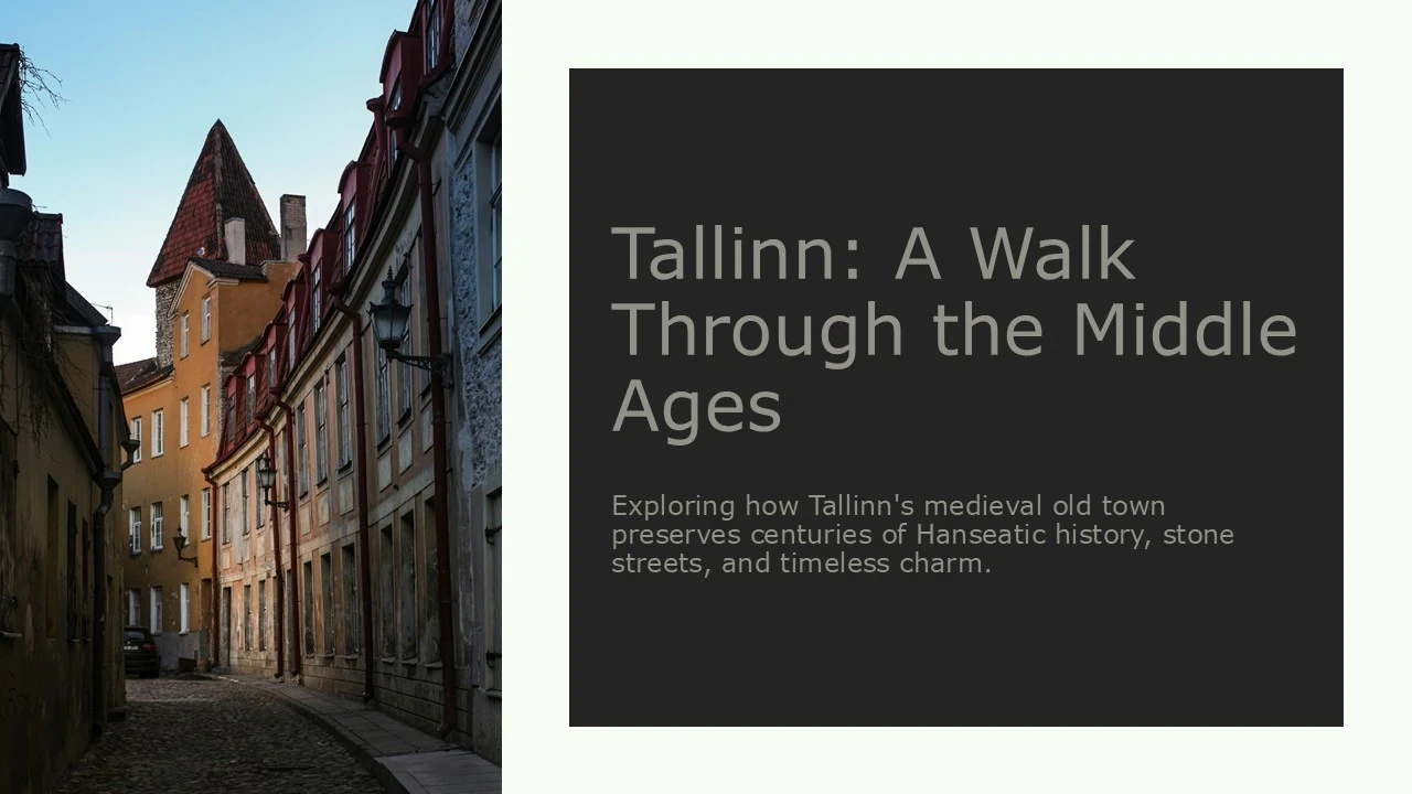 Cobblestone street in Tallinn's medieval old town with historic buildings and a pointed tower.