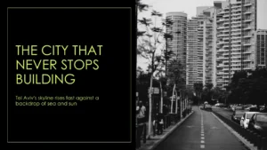 Black and white photograph of a modern city street with high-rise buildings and parked cars.