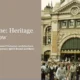 Flinders Street Station facade with Victorian architecture and crowd of pedestrians.