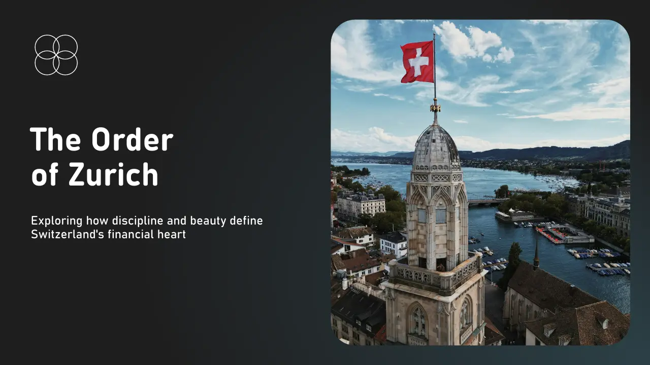 Aerial view of Zurich with a historic tower flying the Swiss flag against a partly cloudy sky.